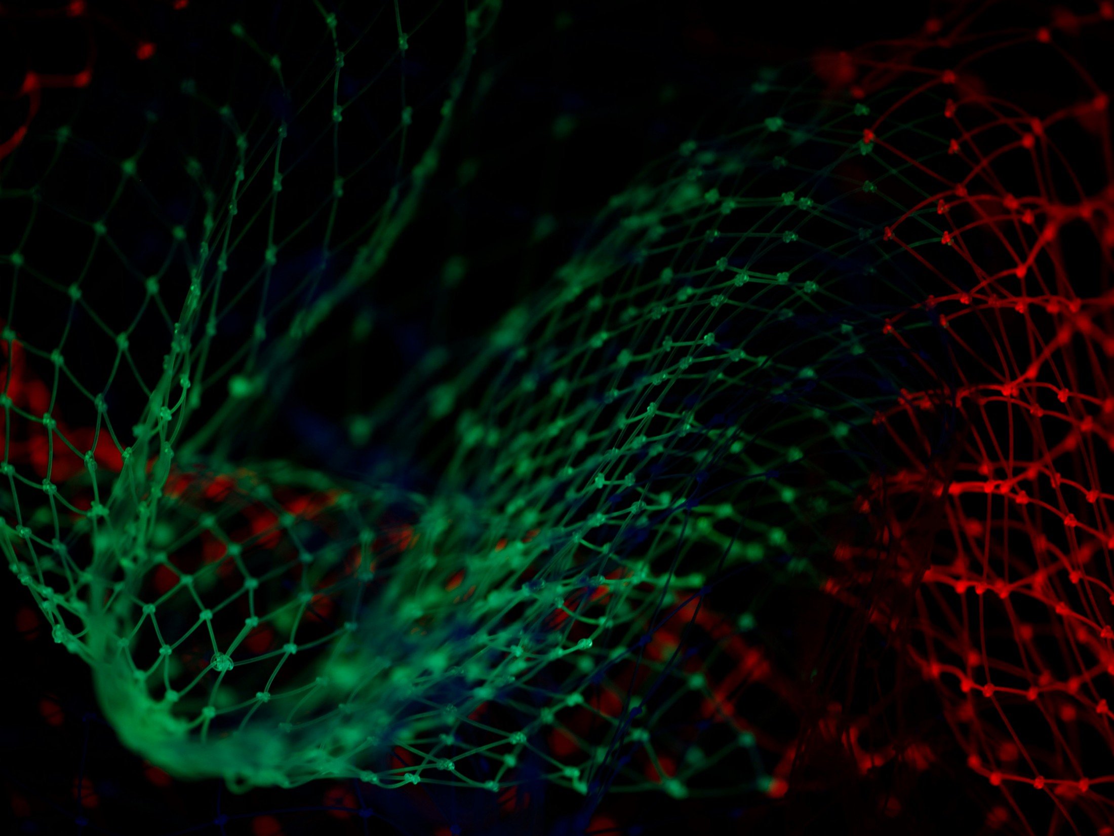 Green light taking over red illustrating Telenor and Ericsson launching a proof of concept for an agentic AI system designed to optimise Radio Access Network (RAN) capacity and power consumption, demonstrating how artificial intelligence can be used to reduce energy consumption and improve sustainability in mobile networks and the broader telecoms sector.
