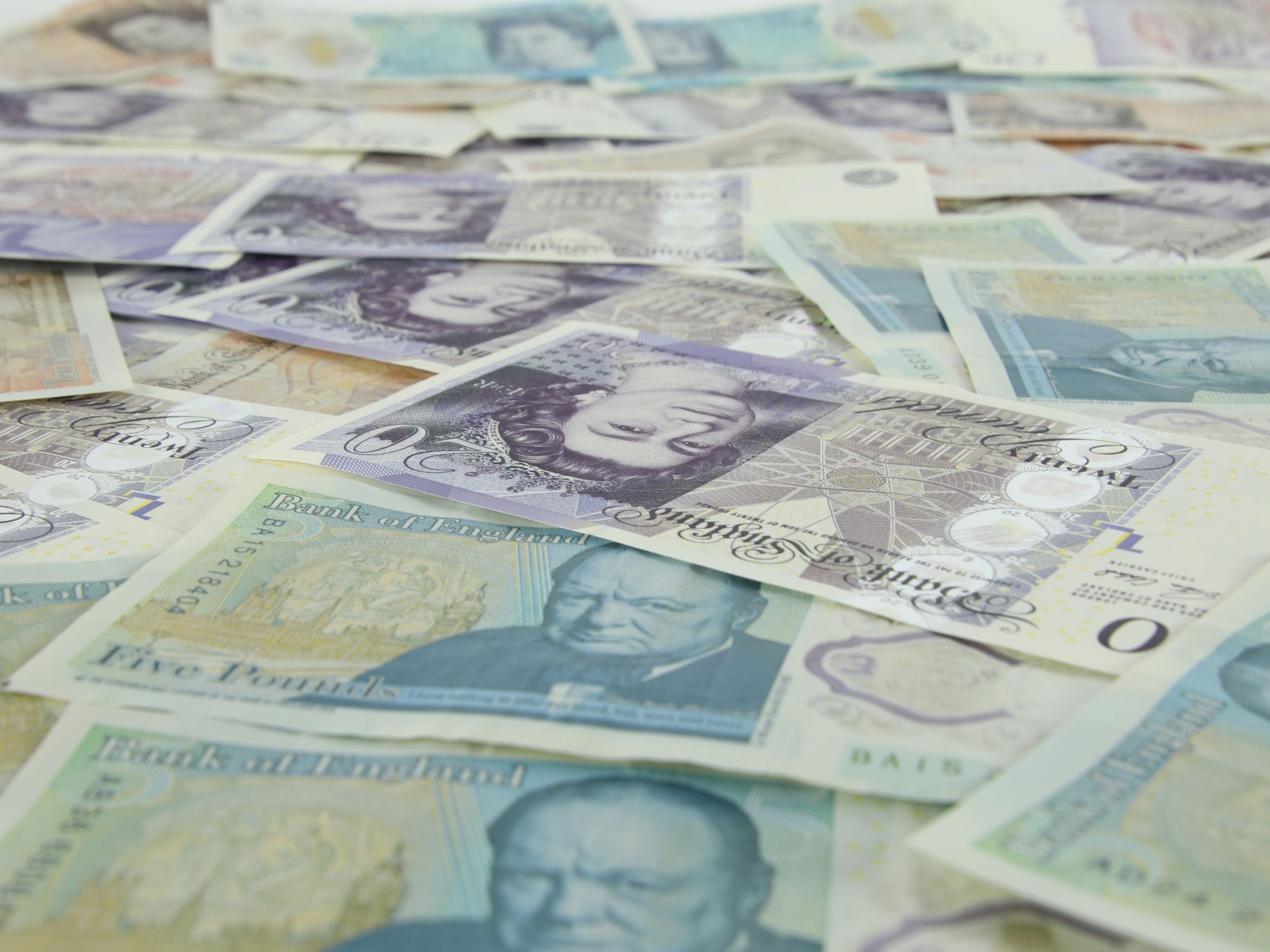 British pounds as notes on a table migrating the UK’s critical national infrastructure (CNI) from ageing analogue networks to modern digital services could generate a net economic benefit of over £3 billion by 2040.