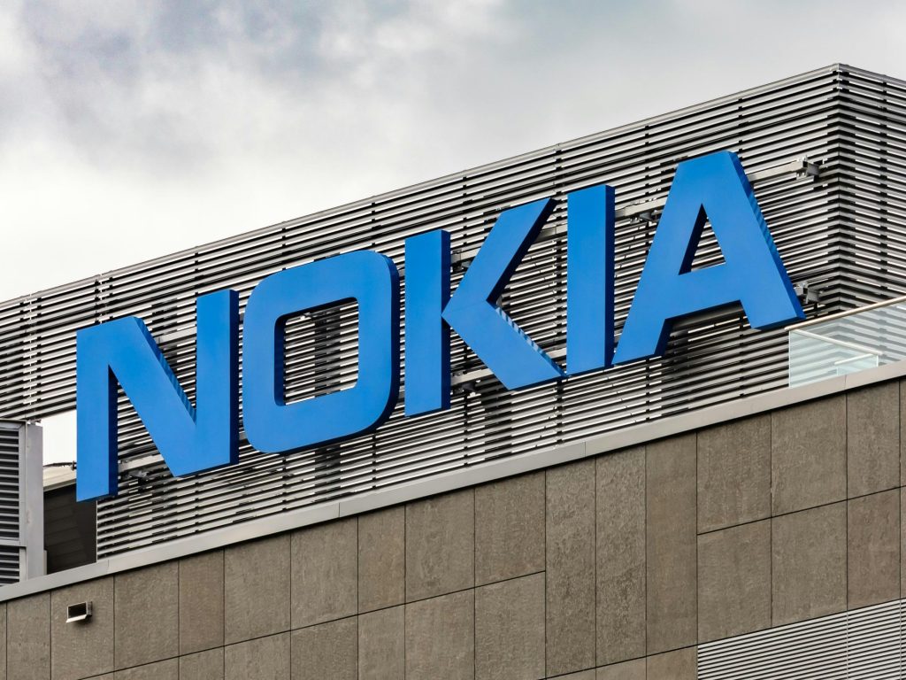 Company logo on a building as Nokia has converted a 2000km production fibre route into an active distributed sensor network using optical tomography.