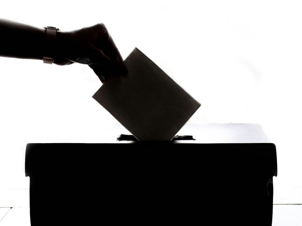 Person casting a vote as the FCC will vote Wednesday to auction 160 megahertz of Upper C-Band spectrum for 5G and 6G networks by 2027.