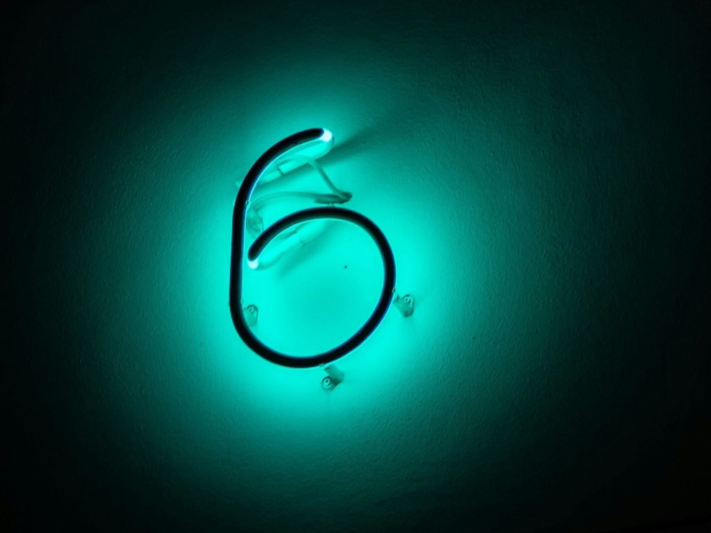 Illuminated number sign as Optus and Nokia ran a 6G trial on a live Sydney mobile site, reaching 3.5Gbps download speeds in upper 6GHz spectrum.
