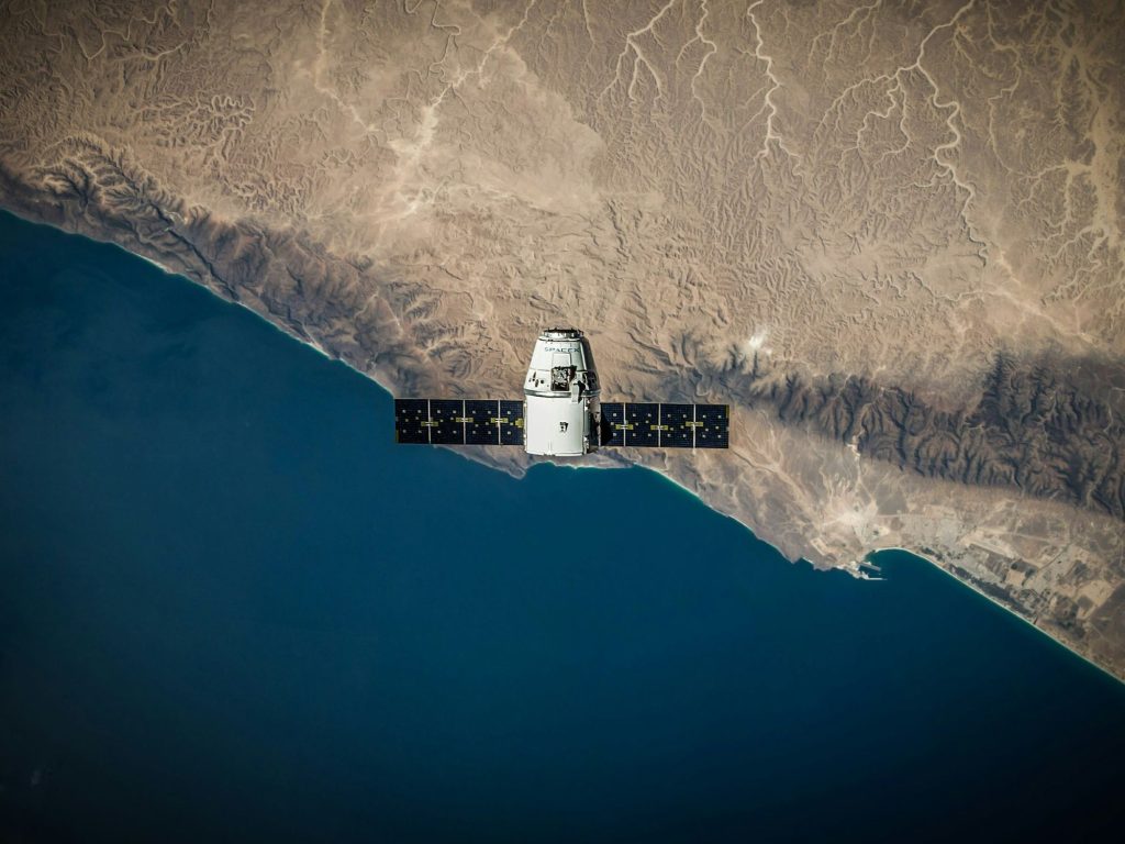 One of SpaceX's satellites in orbit as Omdia forecasts satellite IoT connections will grow from 7.7 million in 2023 to 197.7 million by 2035, at a 31 percent annual rate.